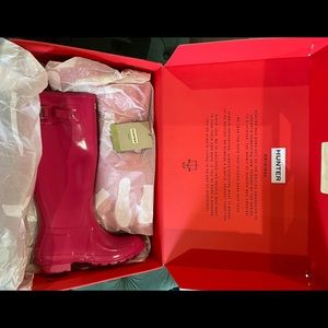 Brand new bright pink Hunter tall rain boot